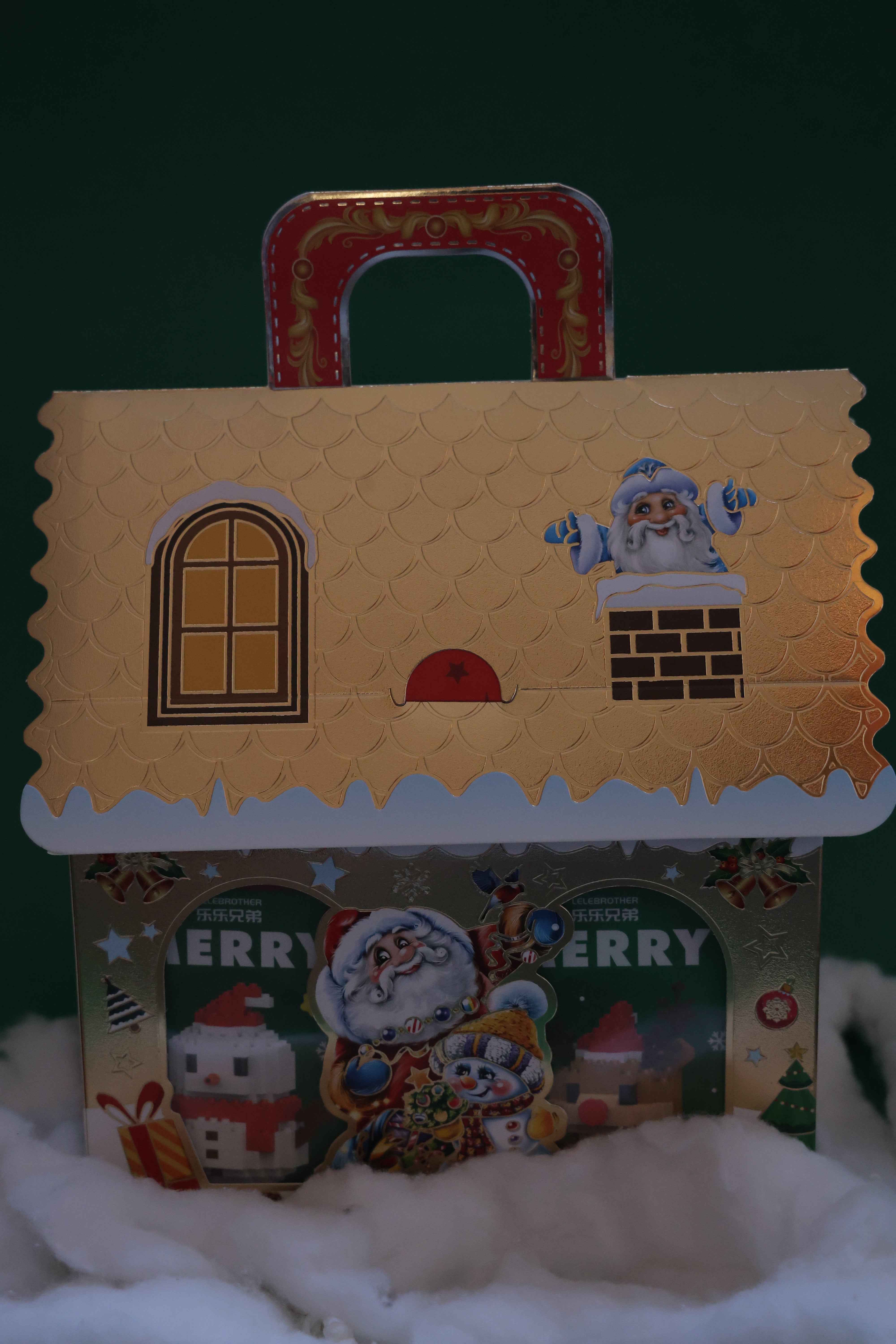 4 Christmas characters with Christmas house